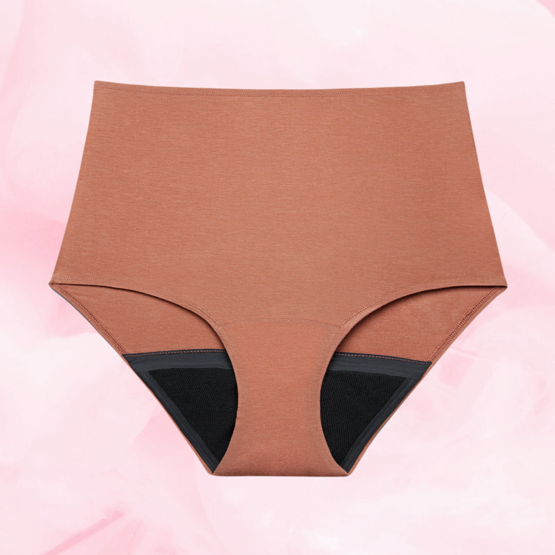 Premium Comfort High Waist -kuukautisalushousut, näkyvissä musta vuorikangas.