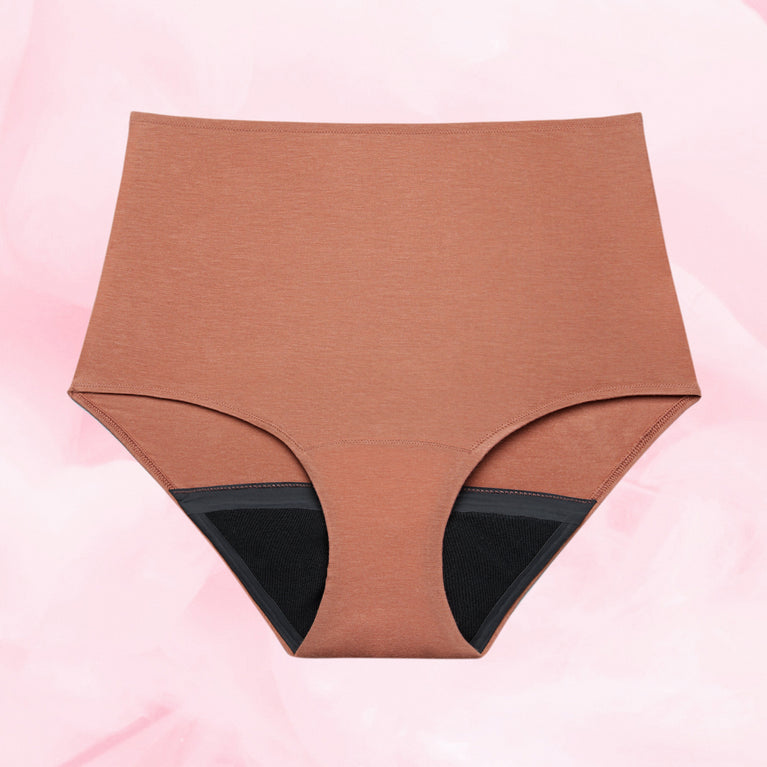 Premium Comfort High Waist -kuukautisalushousut, näkyvissä musta vuorikangas.