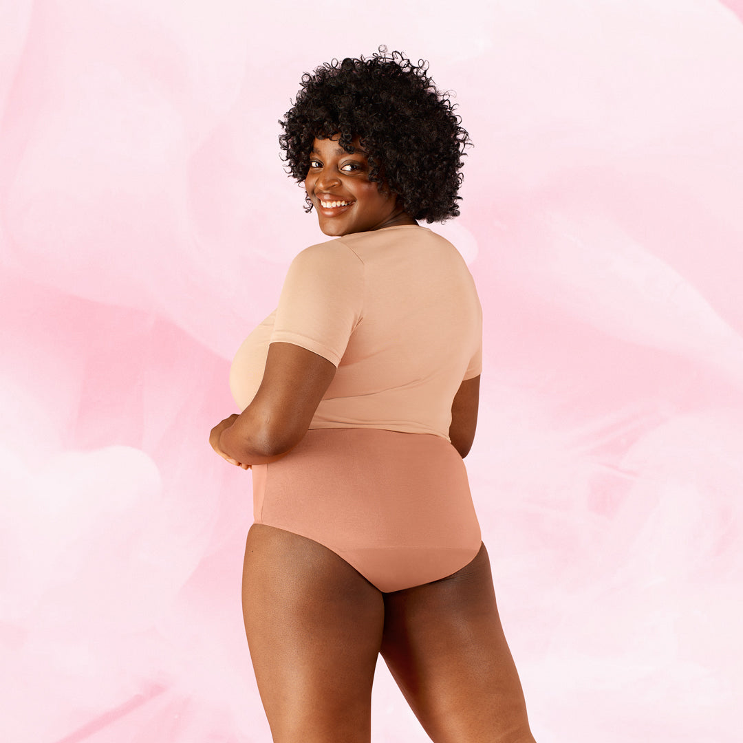 Premium Comfort High Waist Niukka Vuoto Kuukautisalushousut, featuring soft, high-waisted design.