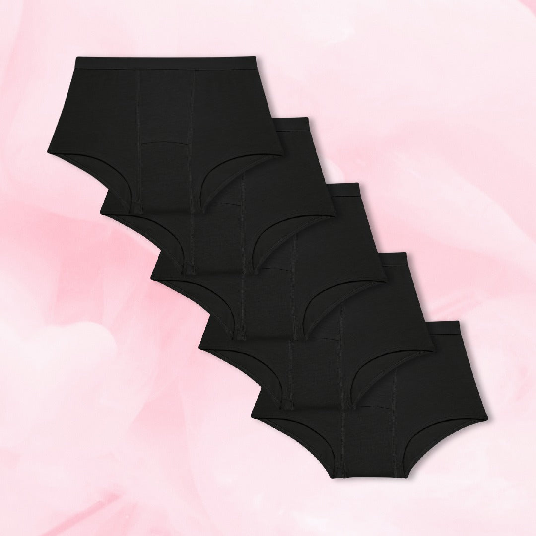 Teens Boxer Kohtalainen vuoto 5-pack, mustat alushousut pinossa.
